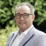 Portretfoto van Gert-Jan van der Putten, te gast bij de MondzorgPodcast Vernieuwde richtlijn Mondverzorging